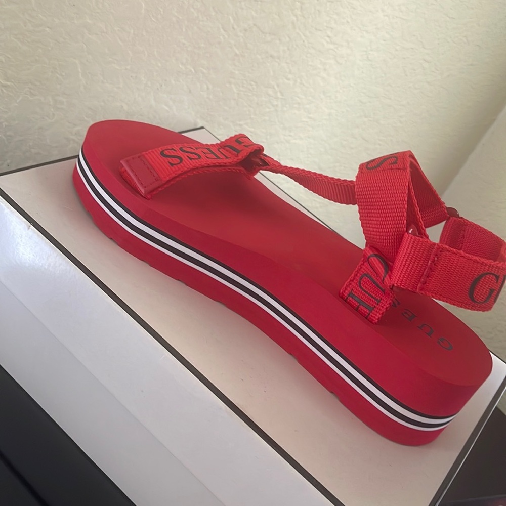 Red “Guess” strappy platform